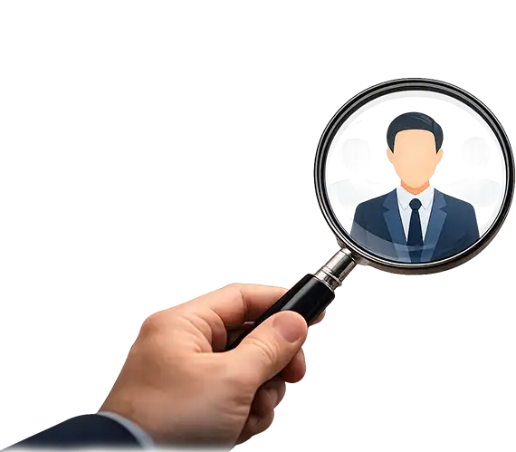 Hand holding magnifying glass over figure